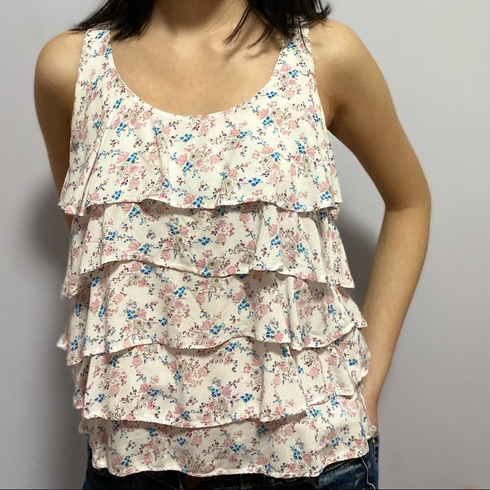 Ruffled white top with floral print